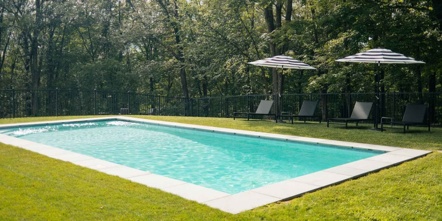 Private swimming pool and patio area at a professionally managed residential property